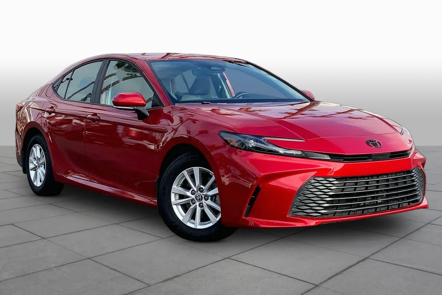 Certified Used 2025 Supersonic Red Toyota LE image 2