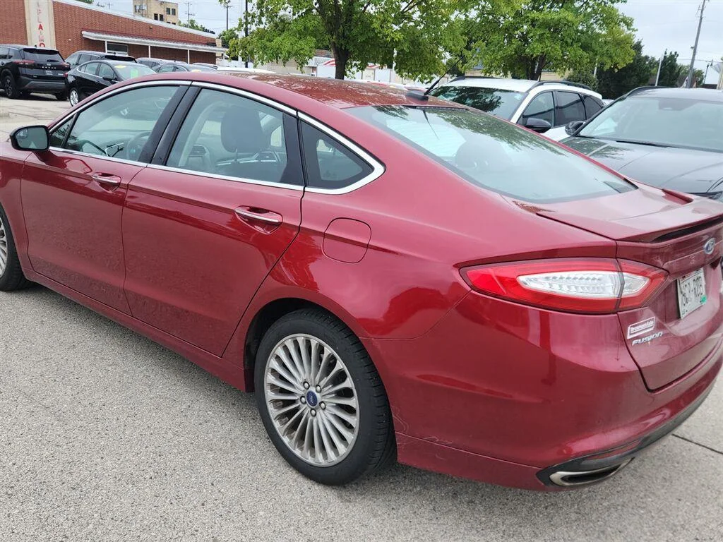Used 2016 Ruby Red Metallic Tinted Clearcoat Ford Titanium image 6