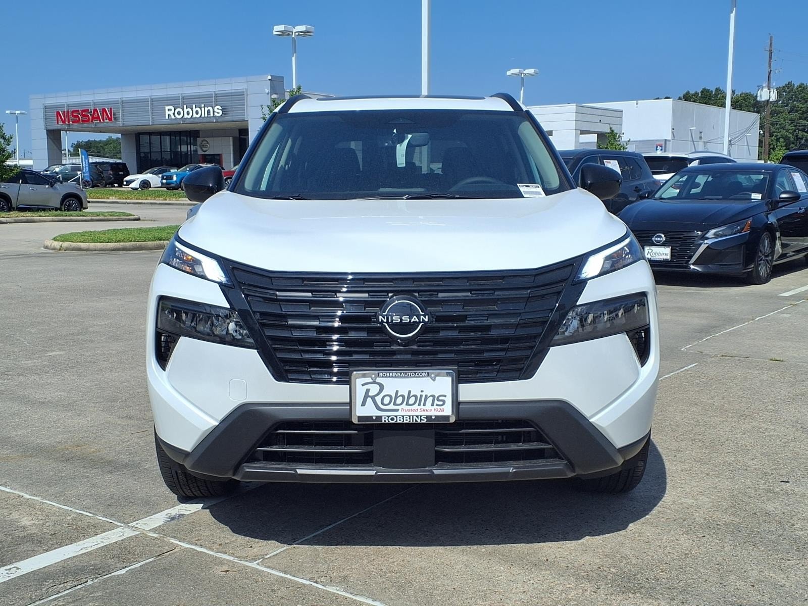 2026 Nissan Rogue Dark Armor™ White at Robbins Nissan