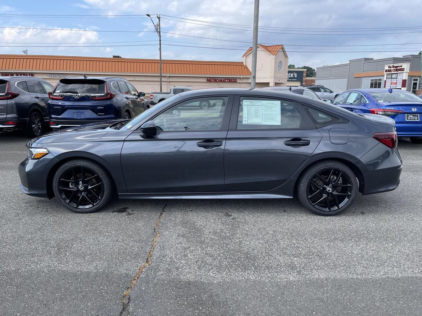Used 2025 Meteorite Gray Metallic Honda Sport image 16