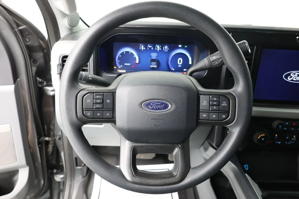 Used 2025 Carbonized Gray Metallic Ford XLT 4WD Crew Cab 6.75