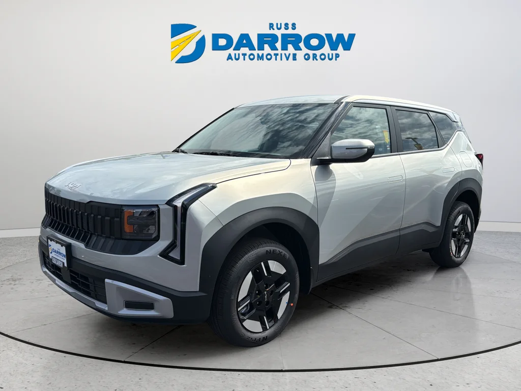 New 2027 Ivory Silver Kia LX image 1