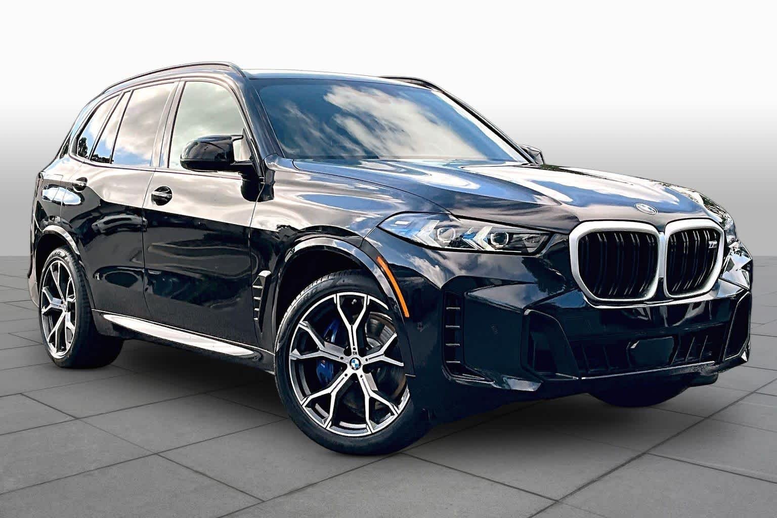 Used 2026 Black Sapphire Metallic BMW M60i image 3