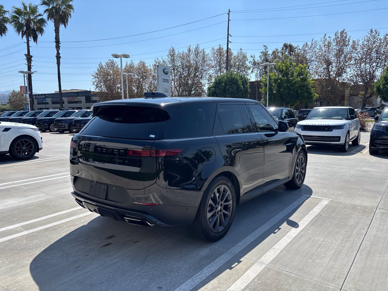 Used 2024 Santorini Black Metallic Land Rover SE image 3