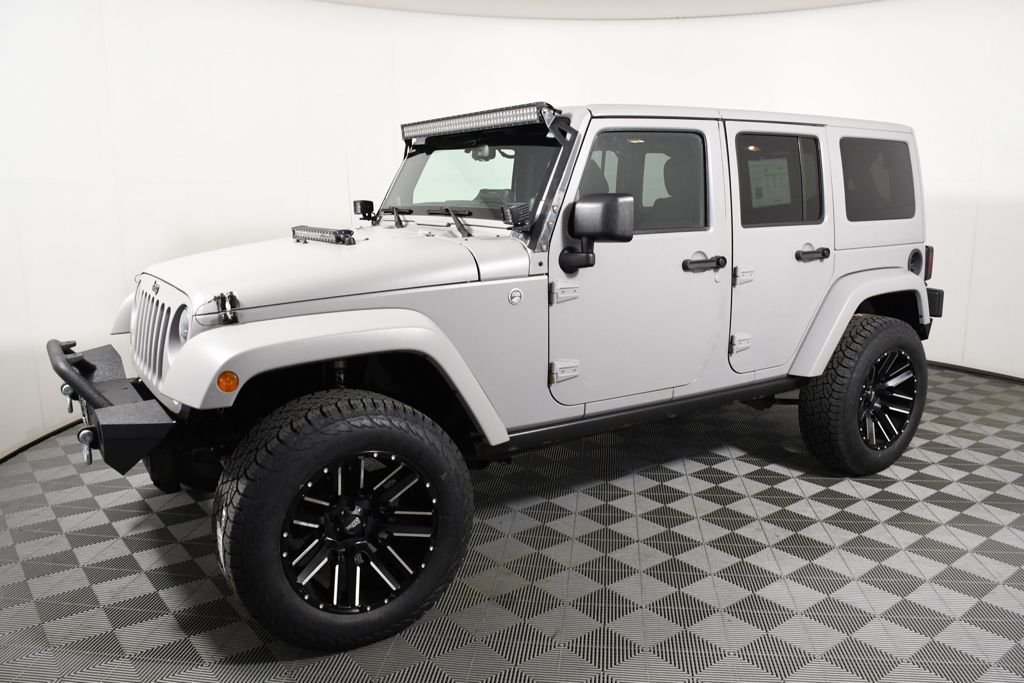 Used 2013 Jeep Wrangler Unlimited Sport with VIN 1C4HJWDG9DL660732 for sale in Richfield, Minnesota