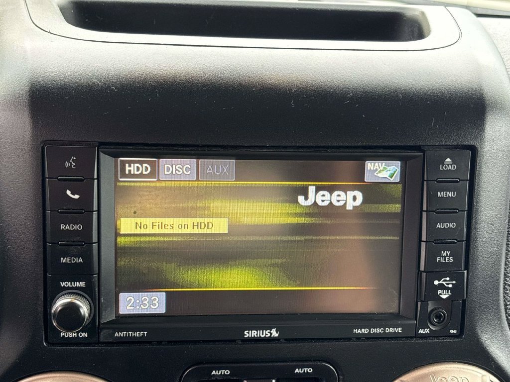 Used 2016 Black Jeep Unlimited Sahara image 25