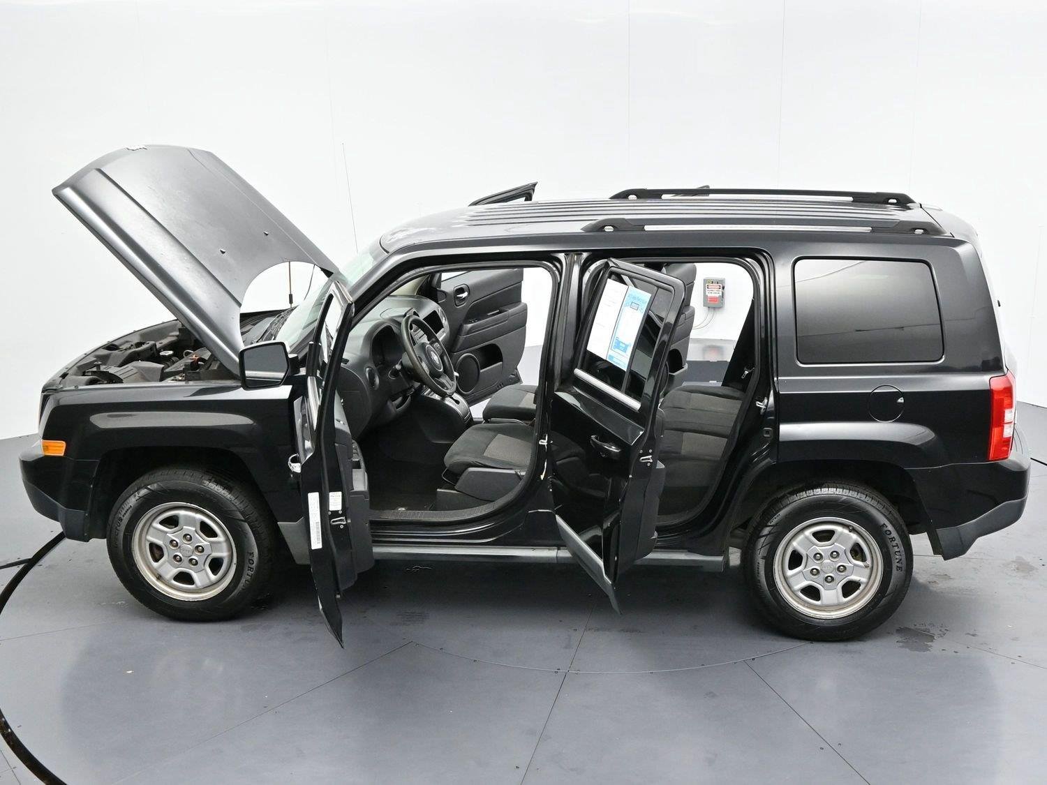 Used 2011 Brilliant Black Crystal Pearl Jeep Sport image 32