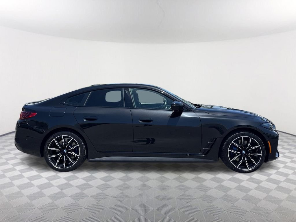 Used 2025 Black Sapphire Metallic BMW eDrive40 image 3