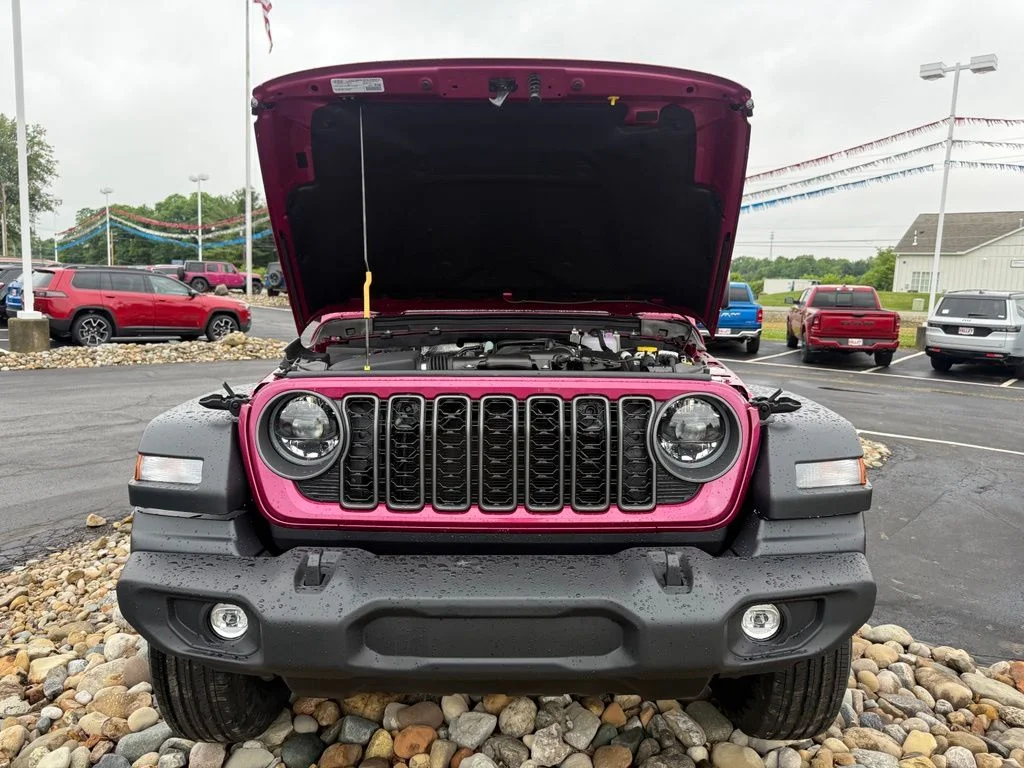 New 2026 Tuscadero Pearl-Coat Exterior Paint Jeep Sport S image 56