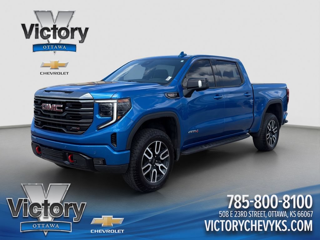 Used 2023 Dynamic Blue Metallic GMC AT4 image 1