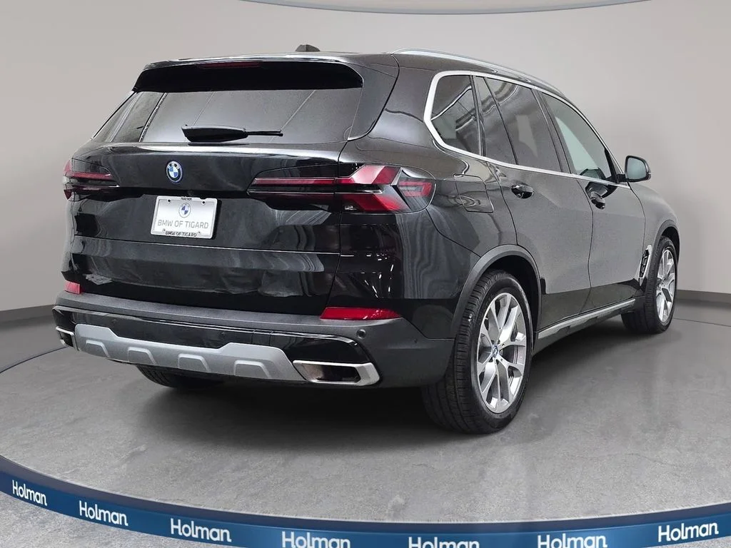 Used 2025 Black Sapphire Metallic BMW xDrive50e image 6