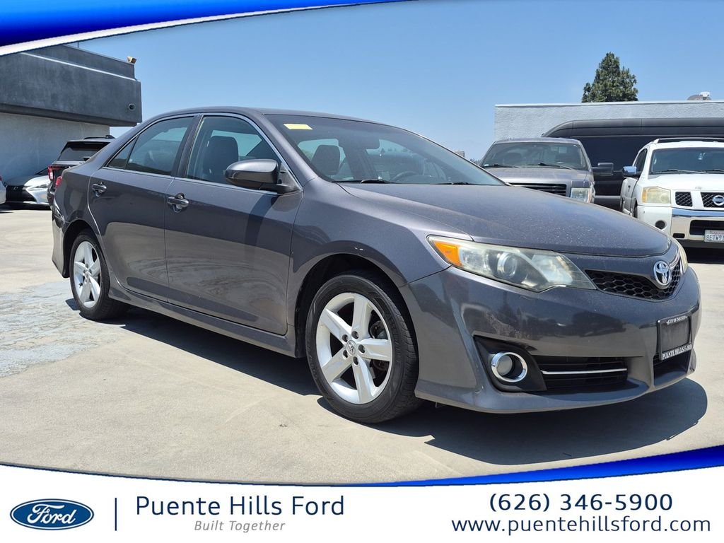 Used 2014 Magnetic Gray Metallic Toyota SE image 1