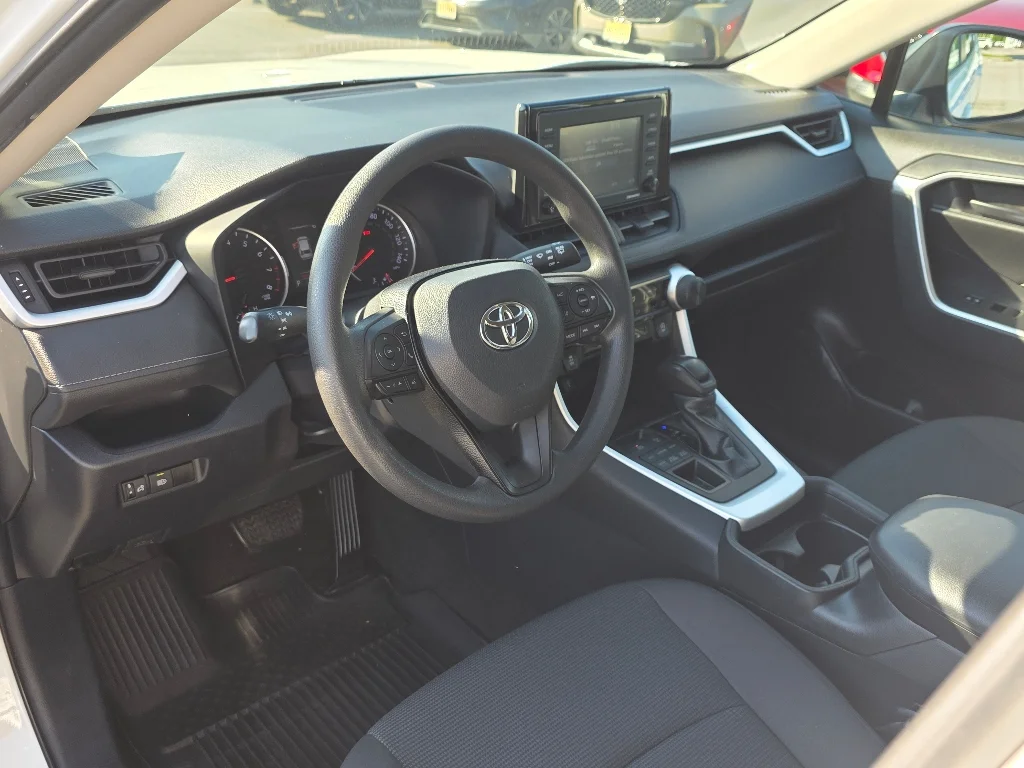 Used 2021 Super White Toyota LE image 30
