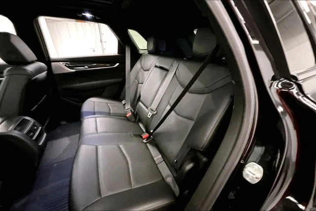 Used 2024 Stellar Black Metallic Cadillac Sport image 25