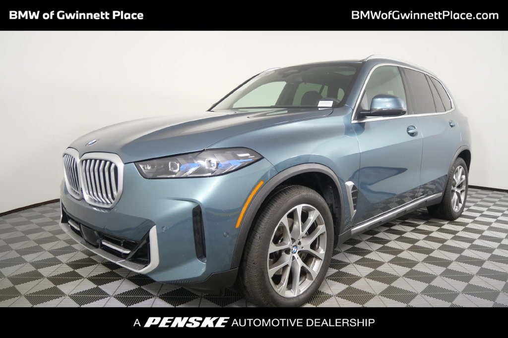 Certified Used 2026 Blue BMW xDrive40i image 1