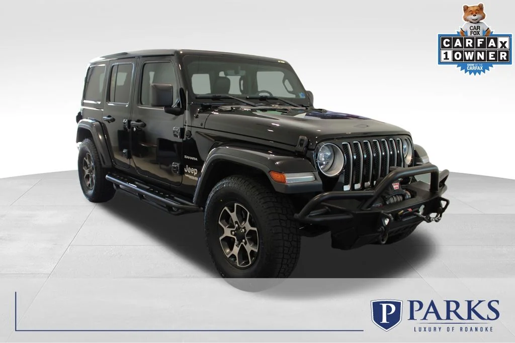 Used 2018 Black Jeep Unlimited Sahara image 1