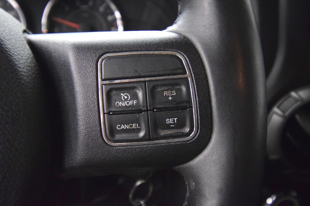Used 2012 Bright Silver Metallic Clearcoat Jeep Sport image 23