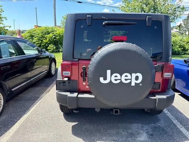 Used 2013 Deep Cherry Red Crystal Jeep Sport image 14