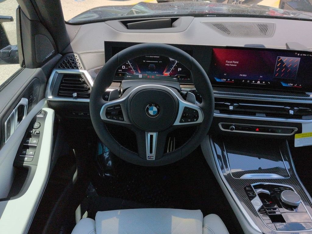New 2026 Black Sapphire Metallic BMW M60i image 16