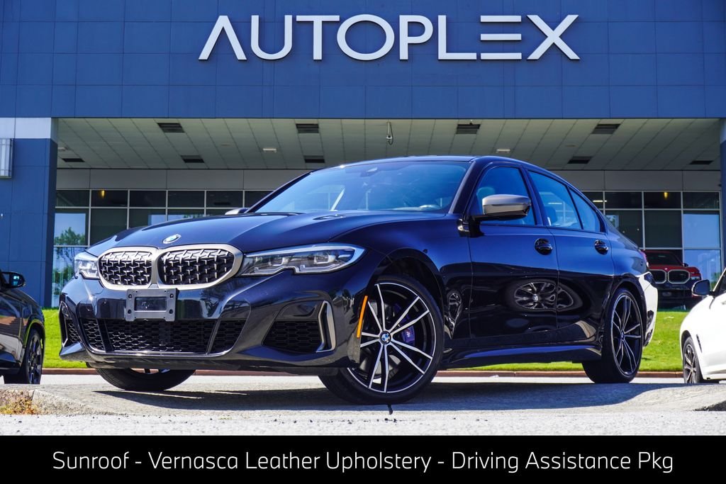 Used 2021 Black BMW M340i xDrive image 1