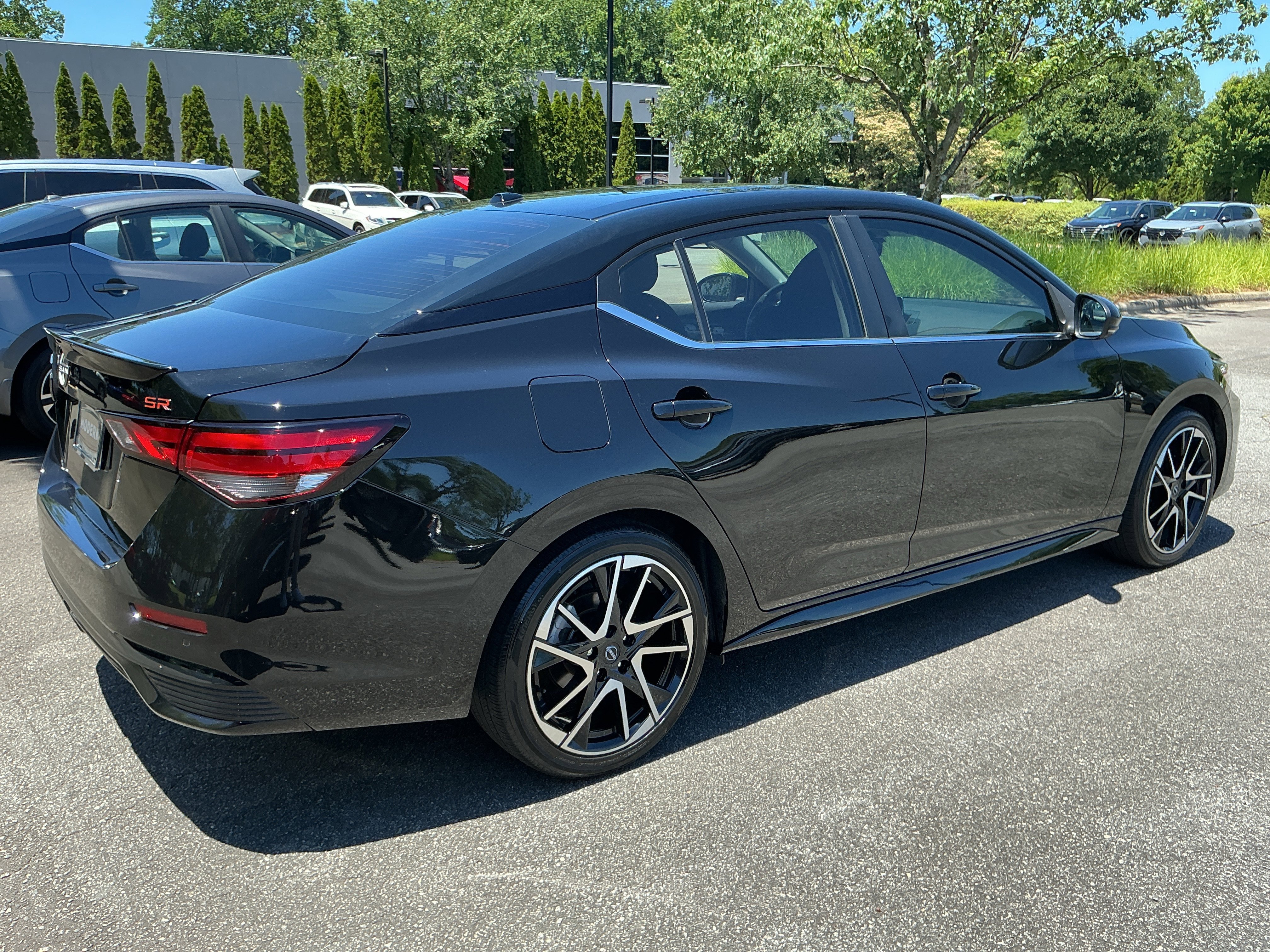 Used 2024 Super Black Nissan SR image 4