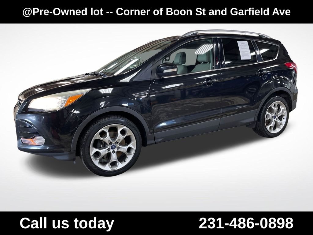 Used 2014 Black Ford Titanium image 1