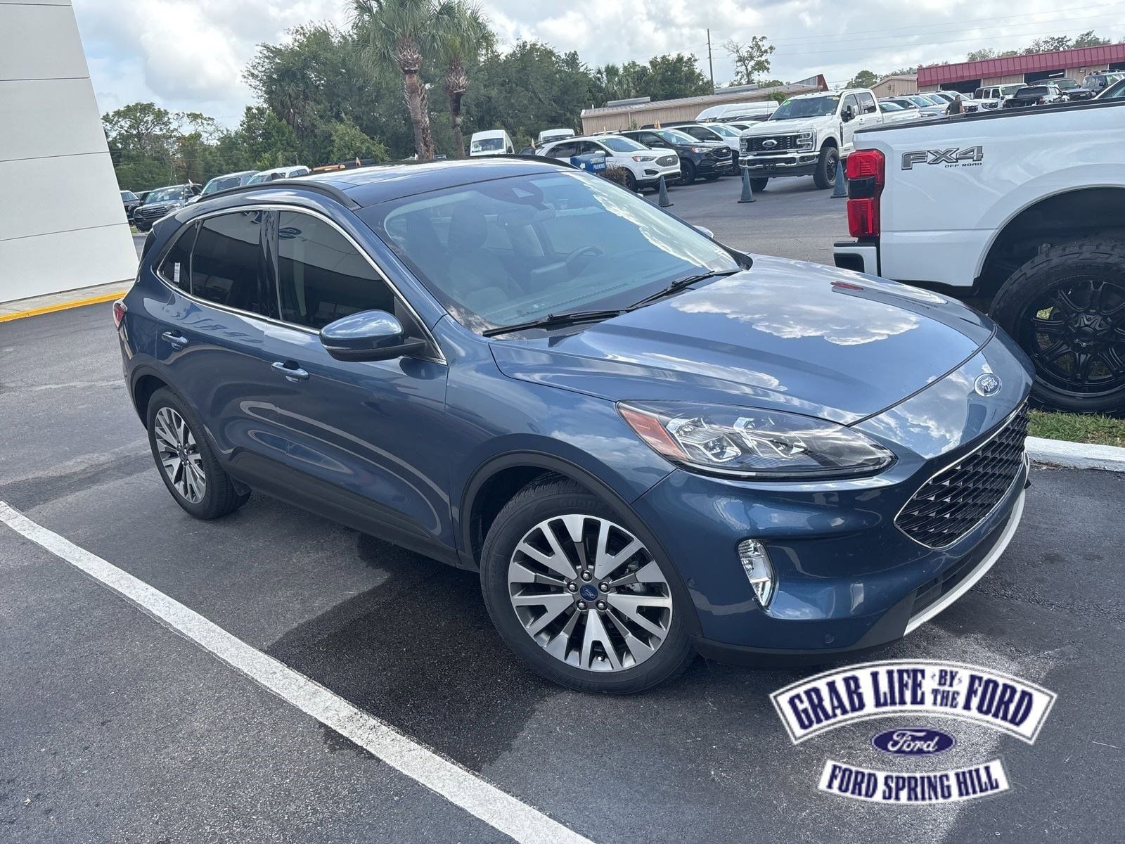Used 2020 Blue Metallic Ford Titanium image 1