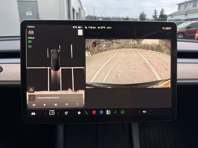 Used 2023 Solid Black Tesla Base image 12
