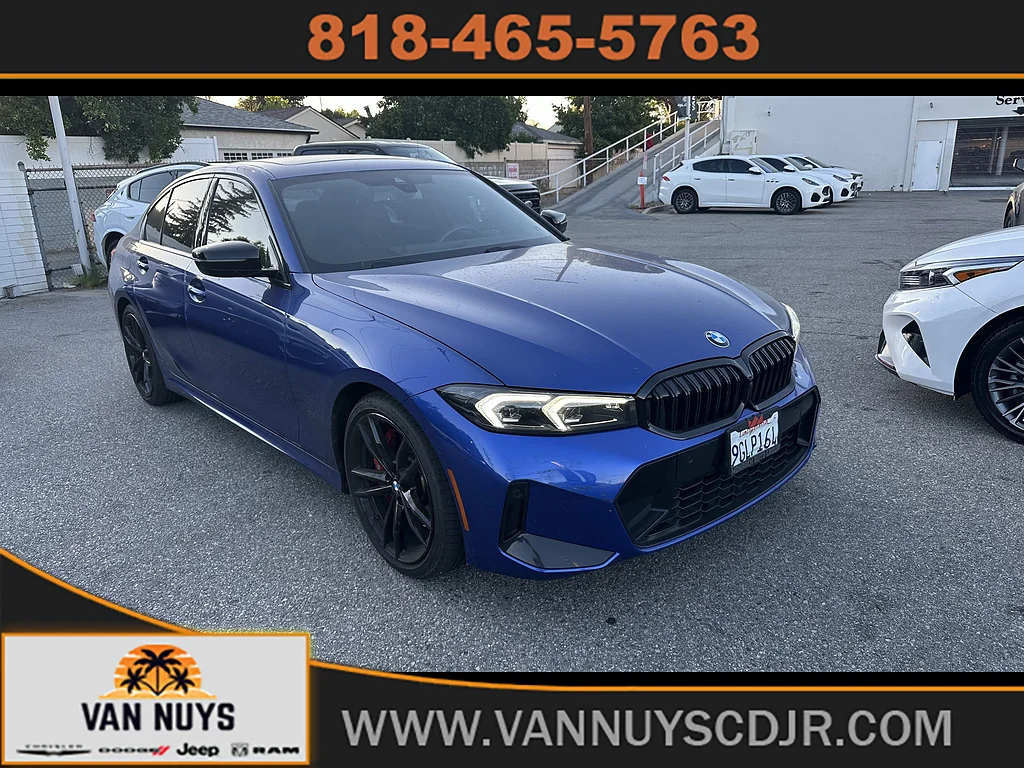 Used 2023 Portimao Blue Metallic BMW 330i image 1