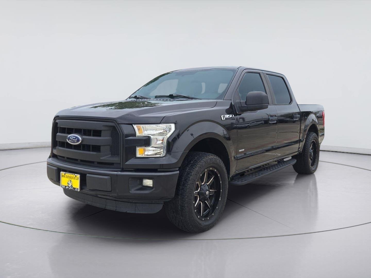 Used 2015 Tuxedo Black Metallic Ford XL image 1