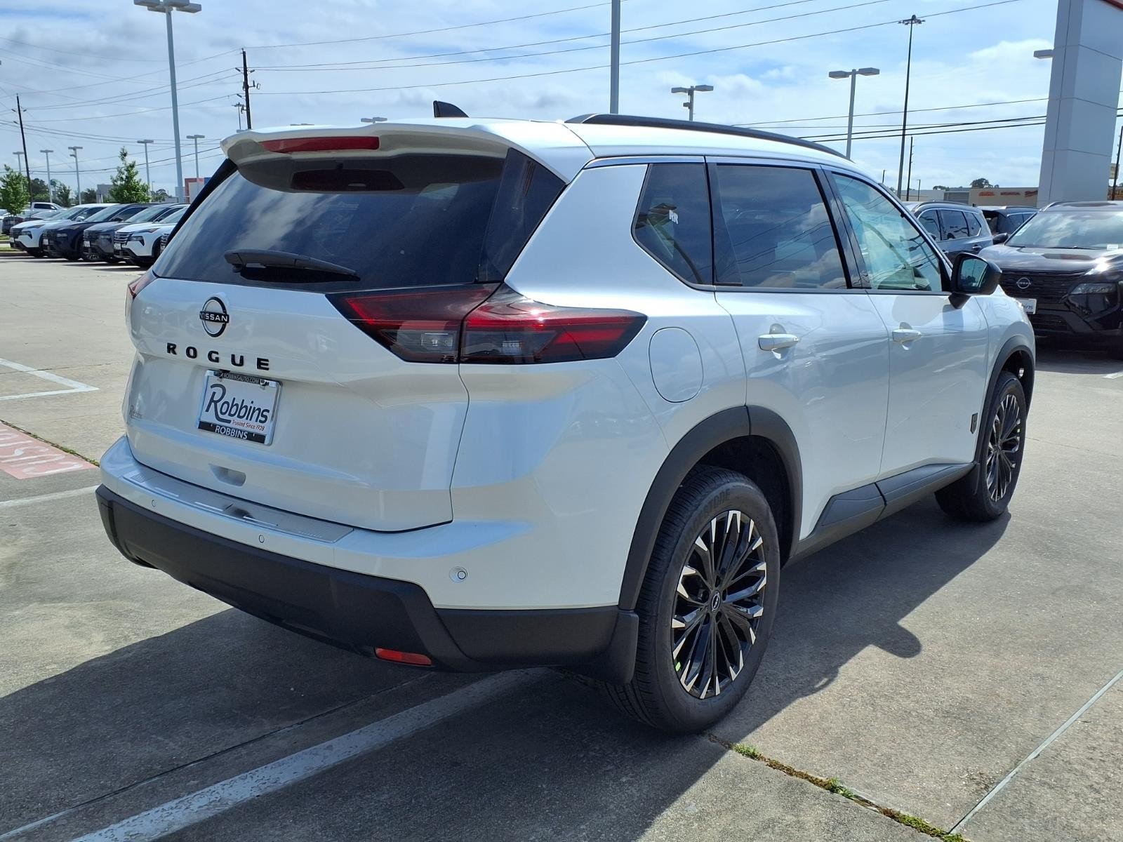 2026 Nissan Rogue Dark Armor™ White at Robbins Nissan