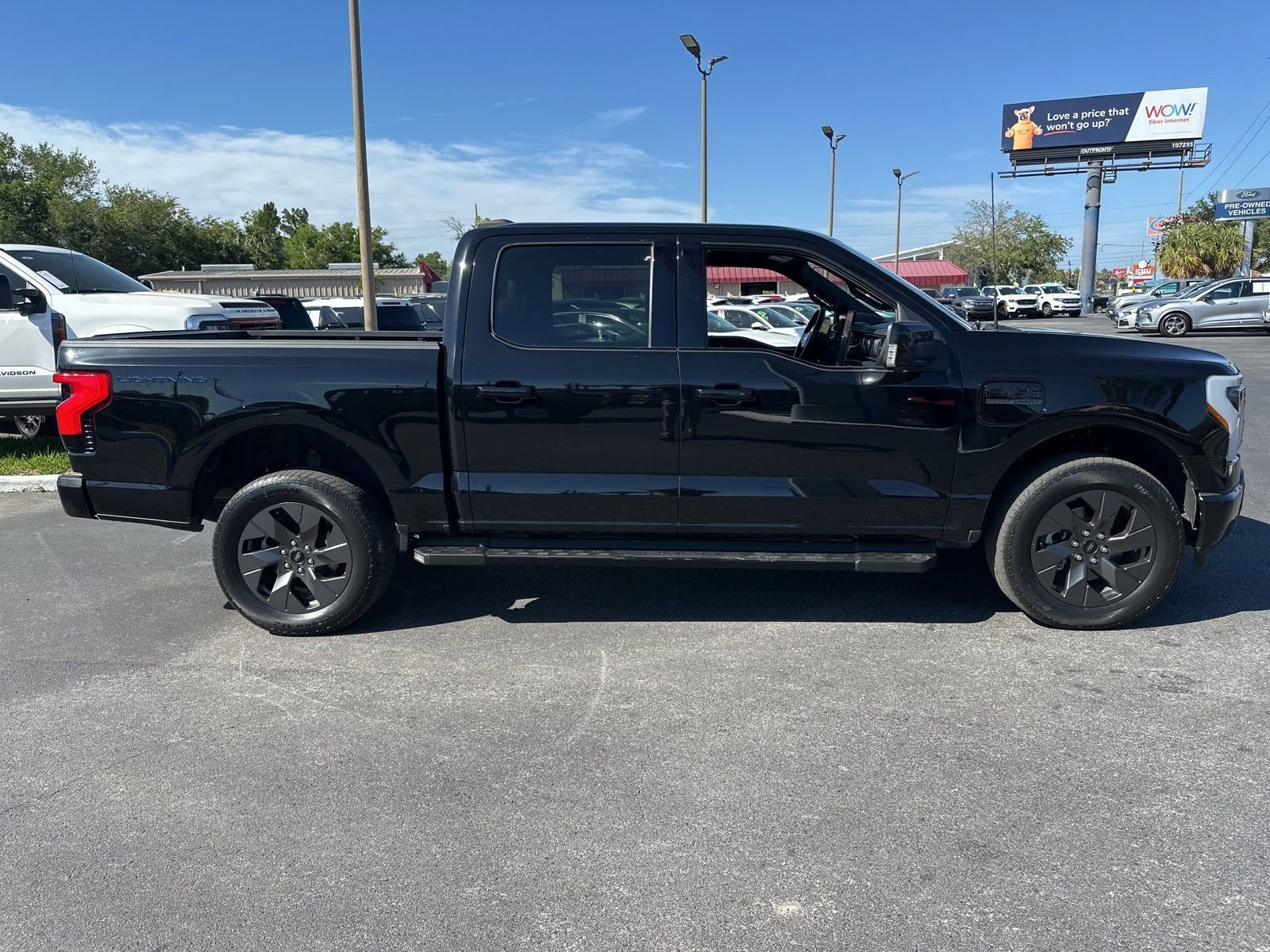 Used 2023 Ford F-150 Lightning Lariat with VIN 1FTVW1ELXPWG06412 for sale in Spring Hill, FL
