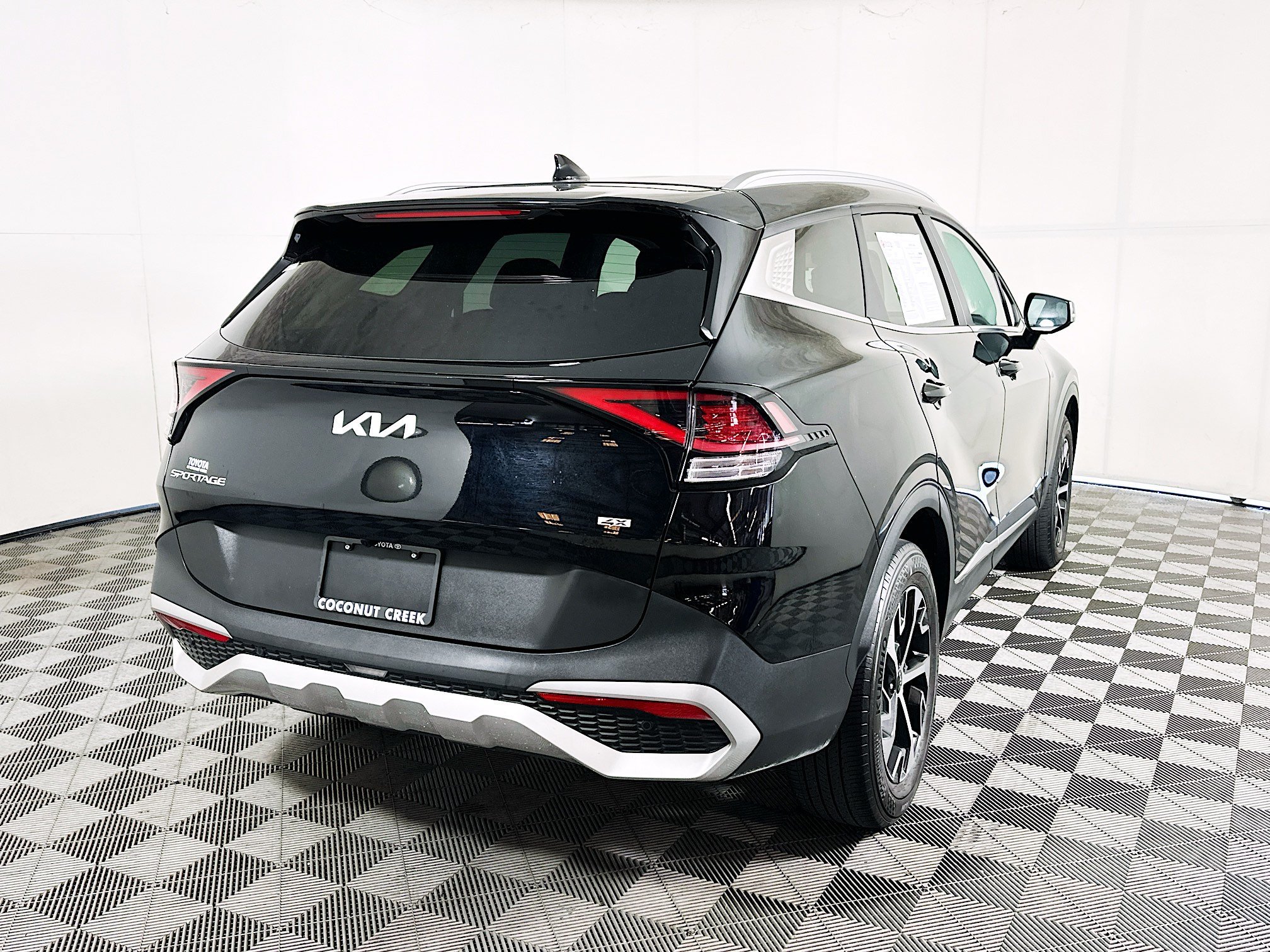Used 2024 Ebony Black Kia EX image 3