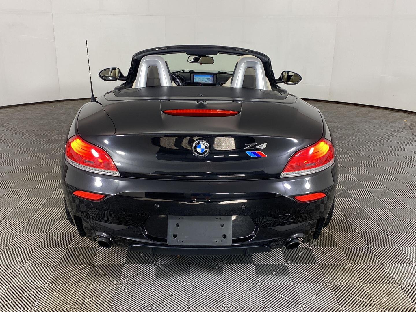 Used 2011 Black Sapphire Metallic BMW sDrive35is image 24