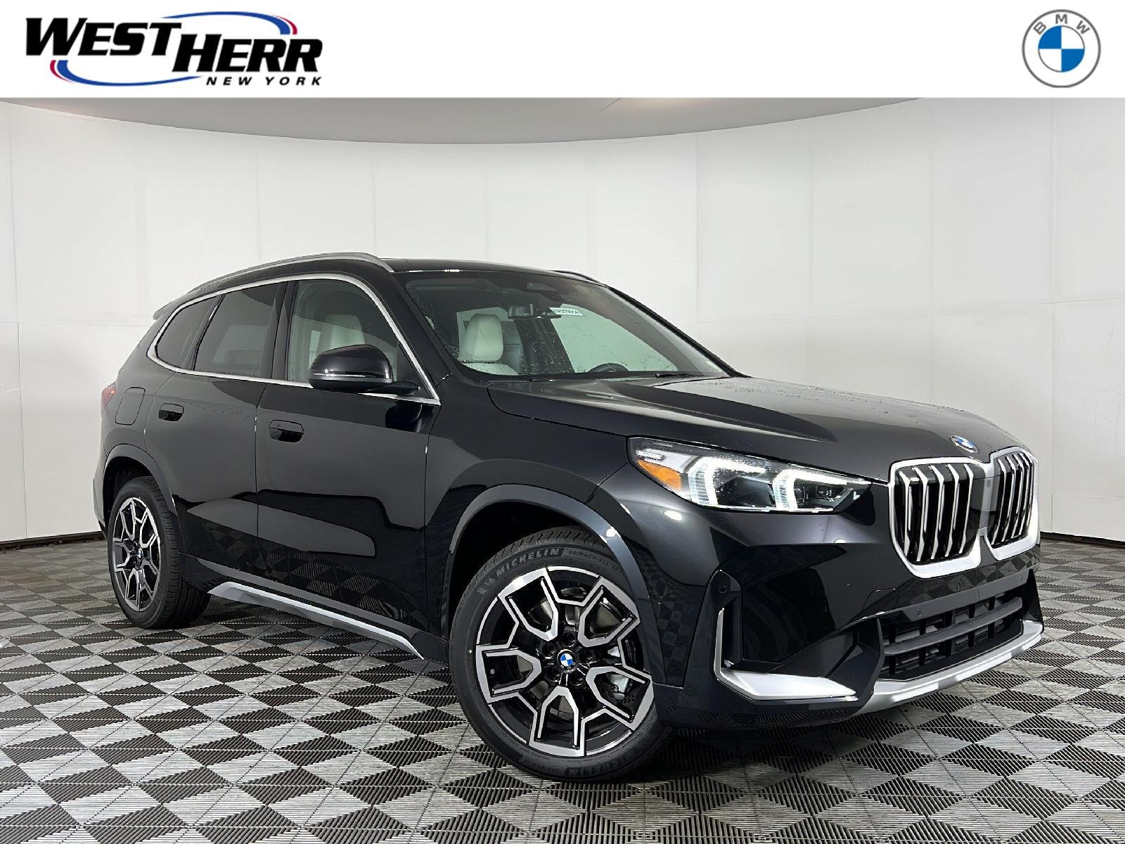 New 2027 Black Sapphire Metallic BMW xDrive28i image 1