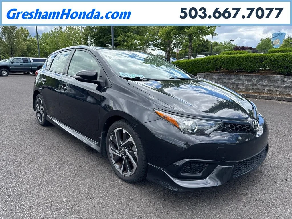 Used 2017 Black Sand Pearl Toyota Base image 1