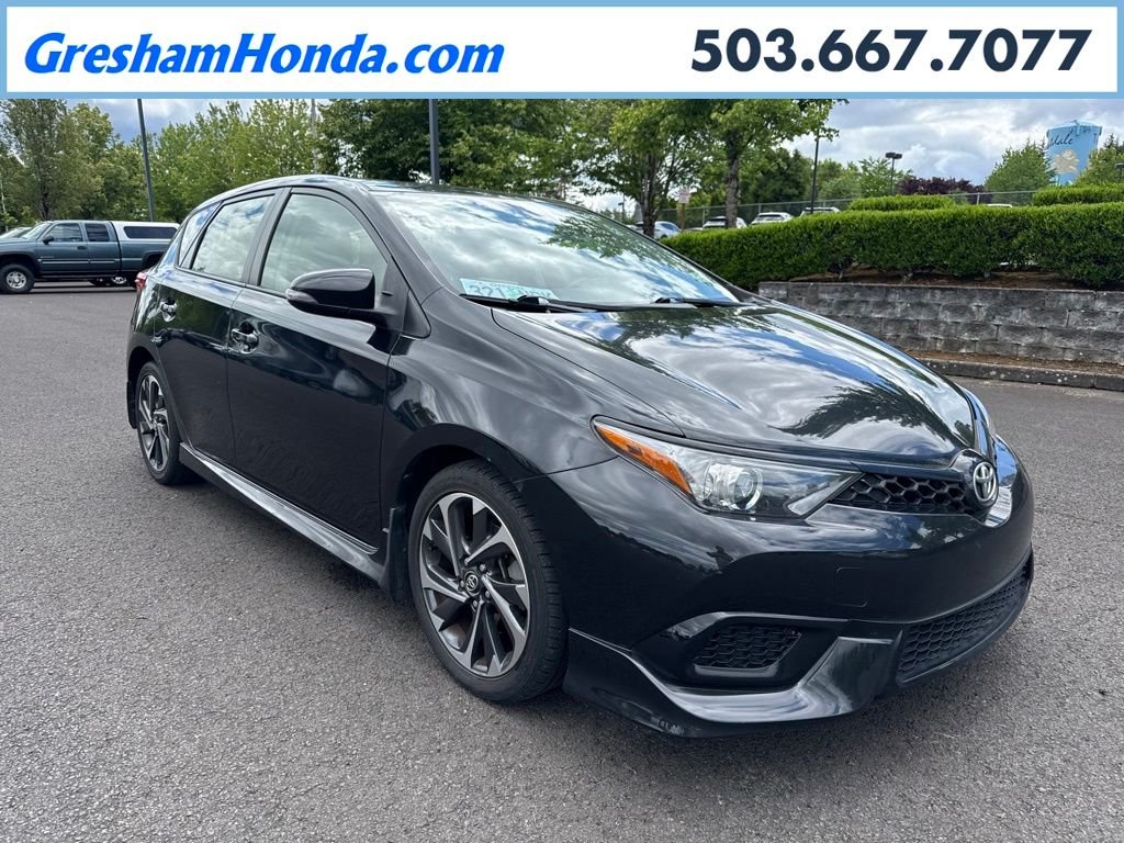 Used 2017 Black Sand Pearl Toyota Base image 1