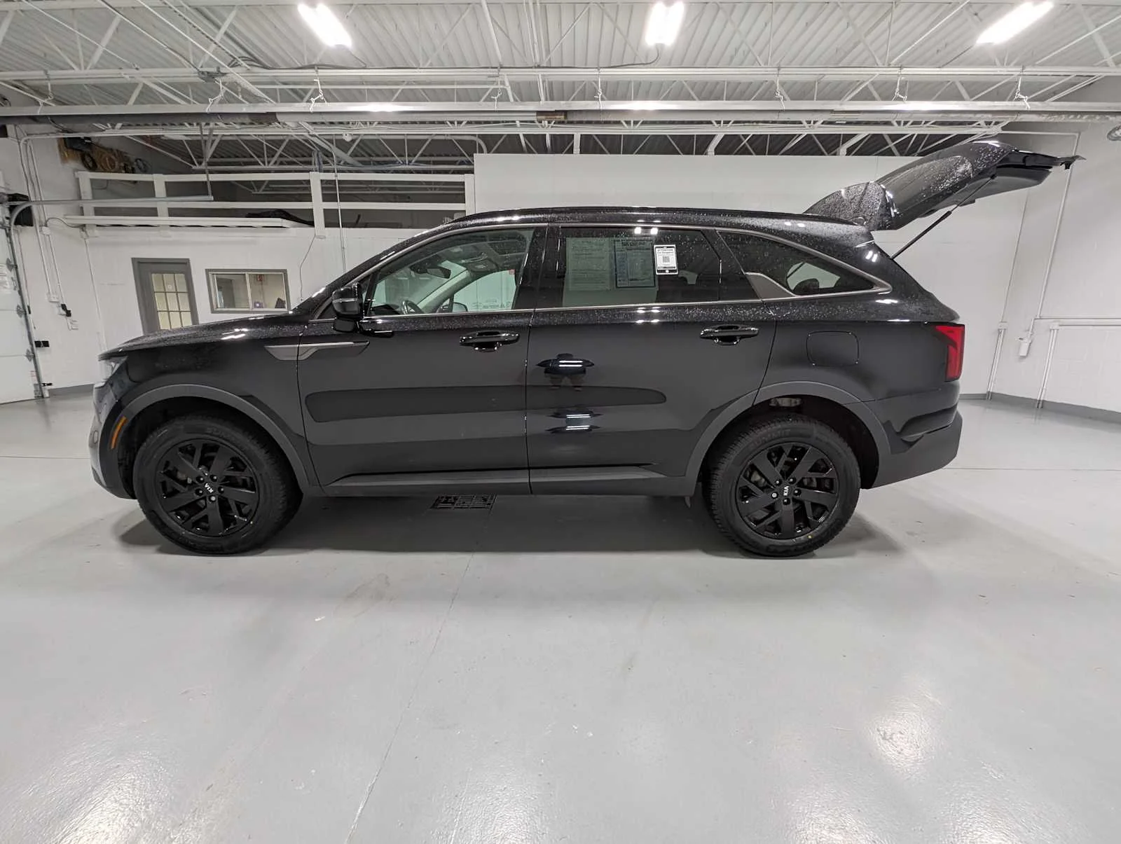 Used 2021 Ebony Black Kia S image 13