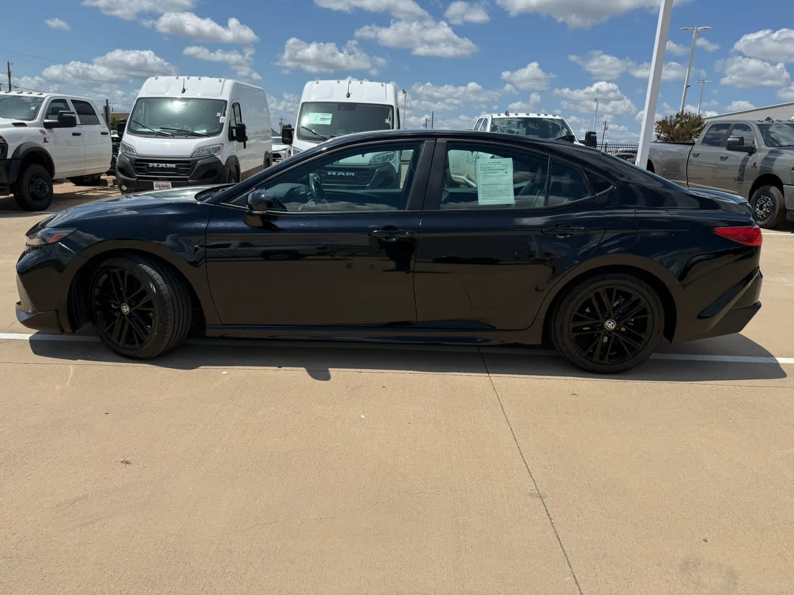 Used 2025 Midnight Black Metallic Toyota XSE image 9