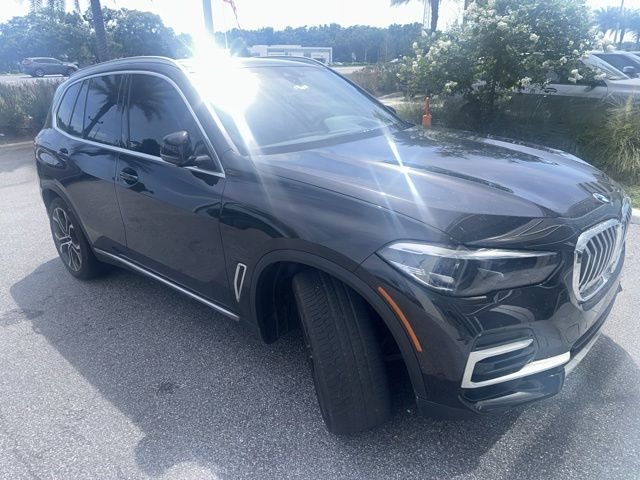 Used 2023 Black Sapphire Metallic BMW sDrive40i image 1