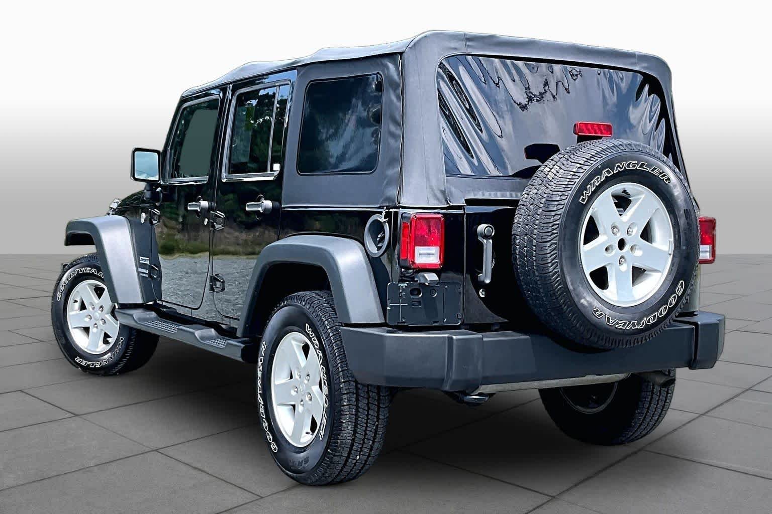 Used 2016 Black Clearcoat Jeep Sport image 12