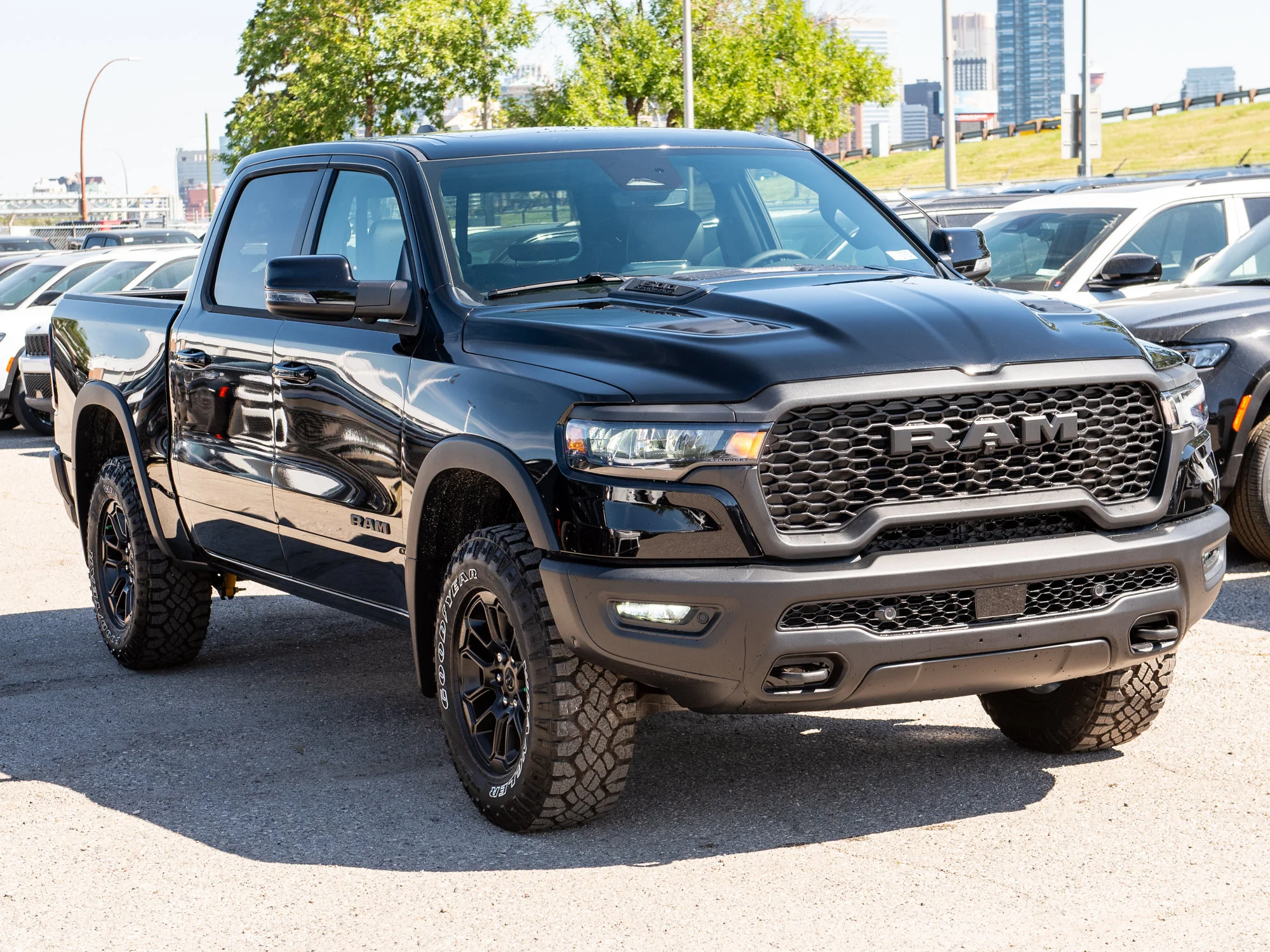 New 2026 Black RAM Rebel* Crew Cab 4x4, 33 Inch A/T Tires, Pano Sunroof, Passenger Screen image 10