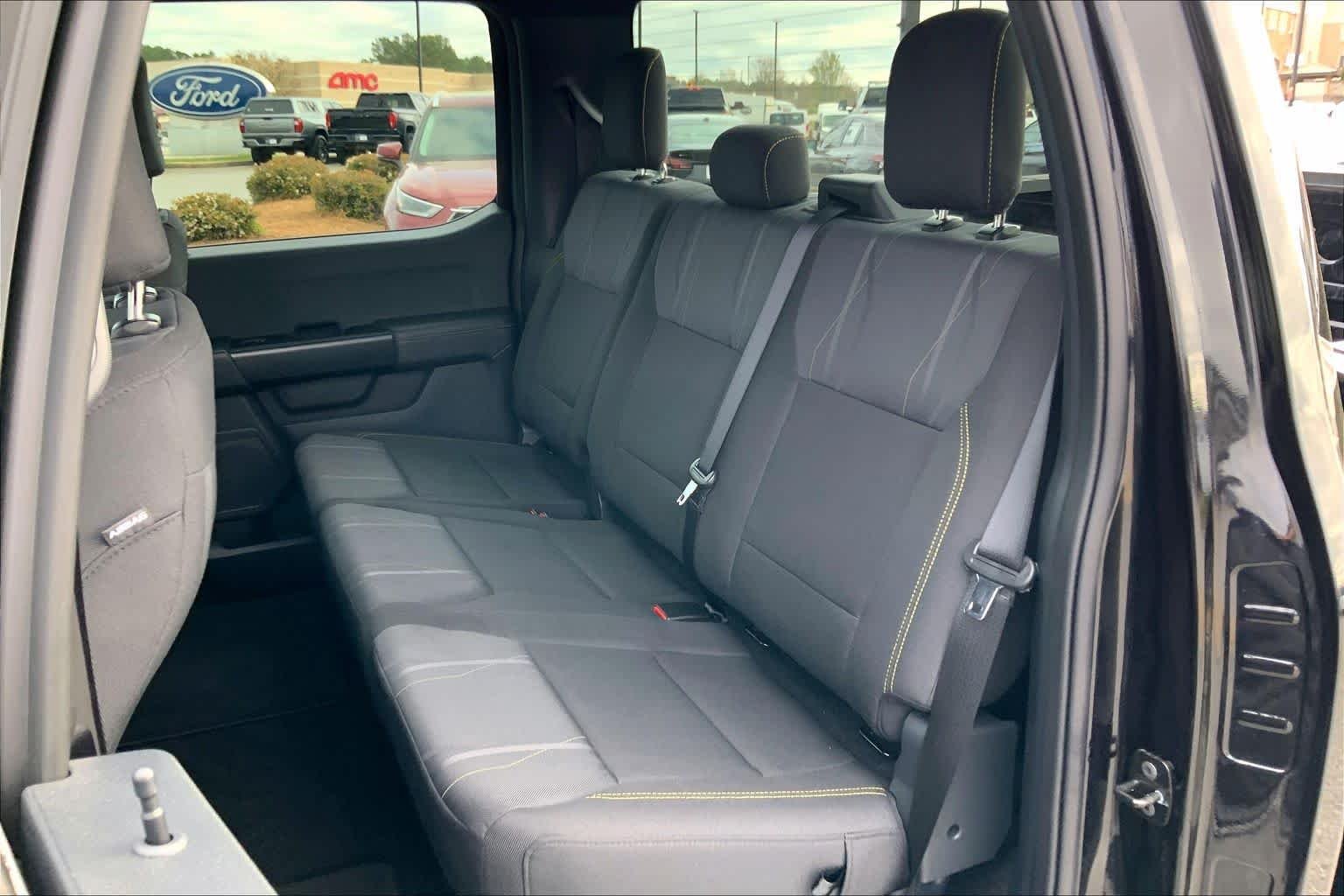 Used 2025 Agate Black Metallic Ford STX image 32