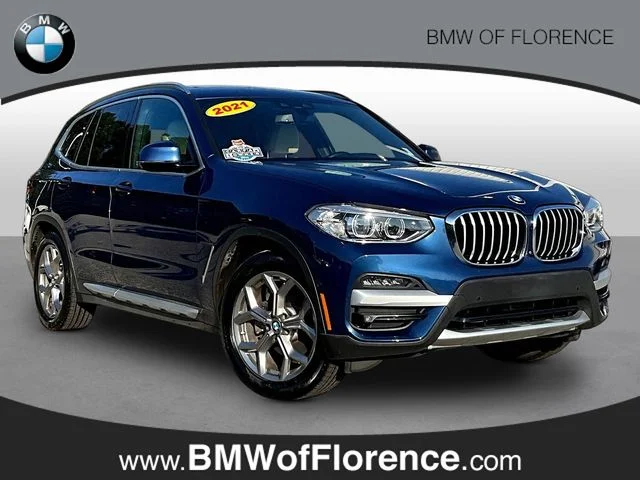 Used 2021 Blue BMW sDrive30i image 1