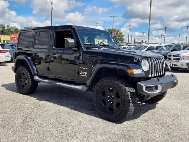 Used 2019 Black Jeep Unlimited Sahara image 1