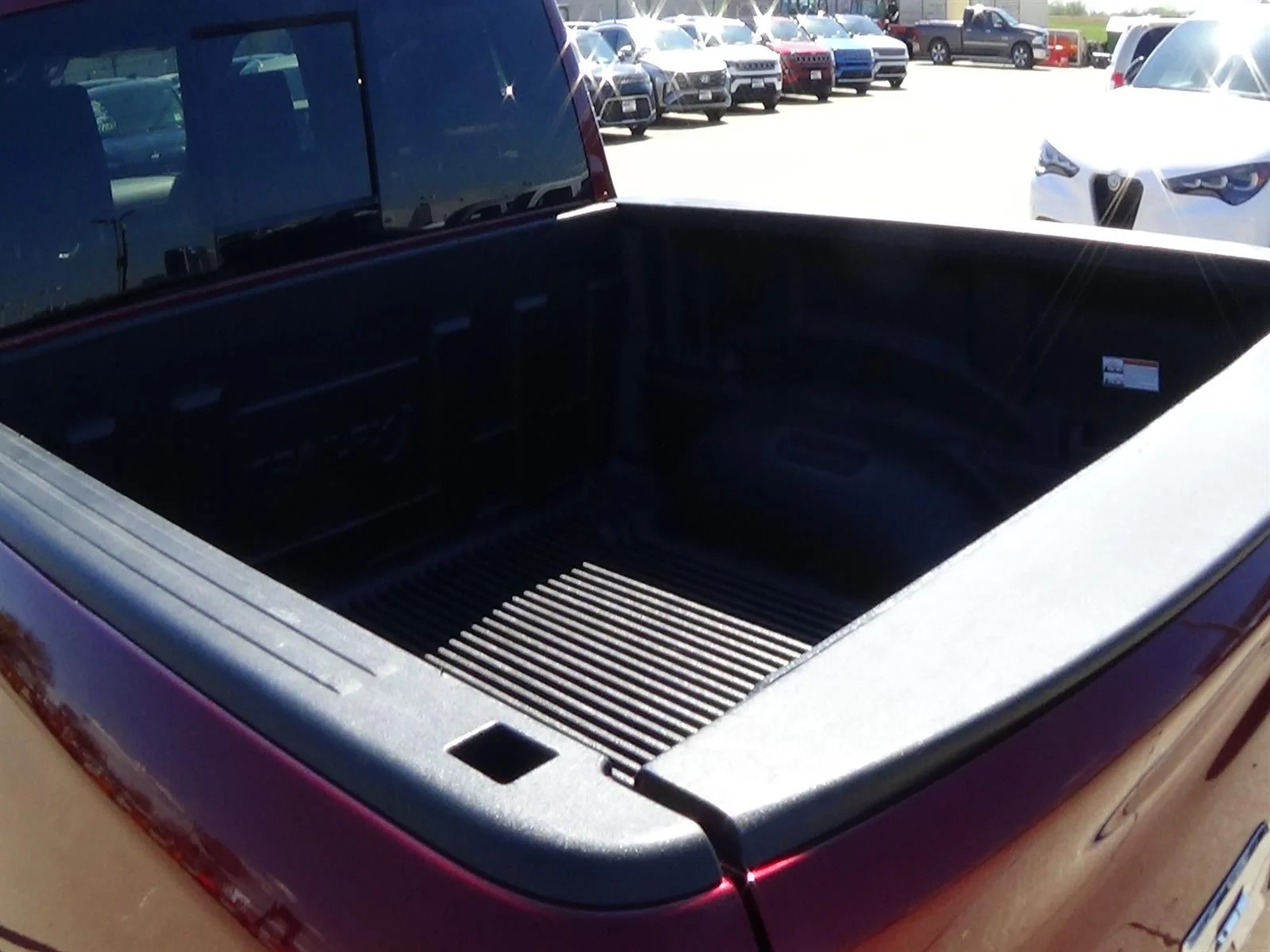 Used 2025 Delmonico Red Pearl Coat (prv) RAM Laramie image 11