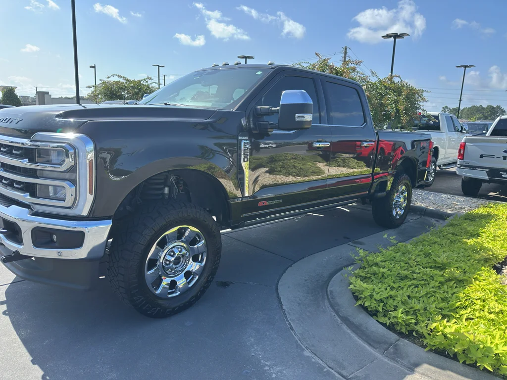 Used 2025 Darkened Bronze Metallic Ford King Ranch image 1