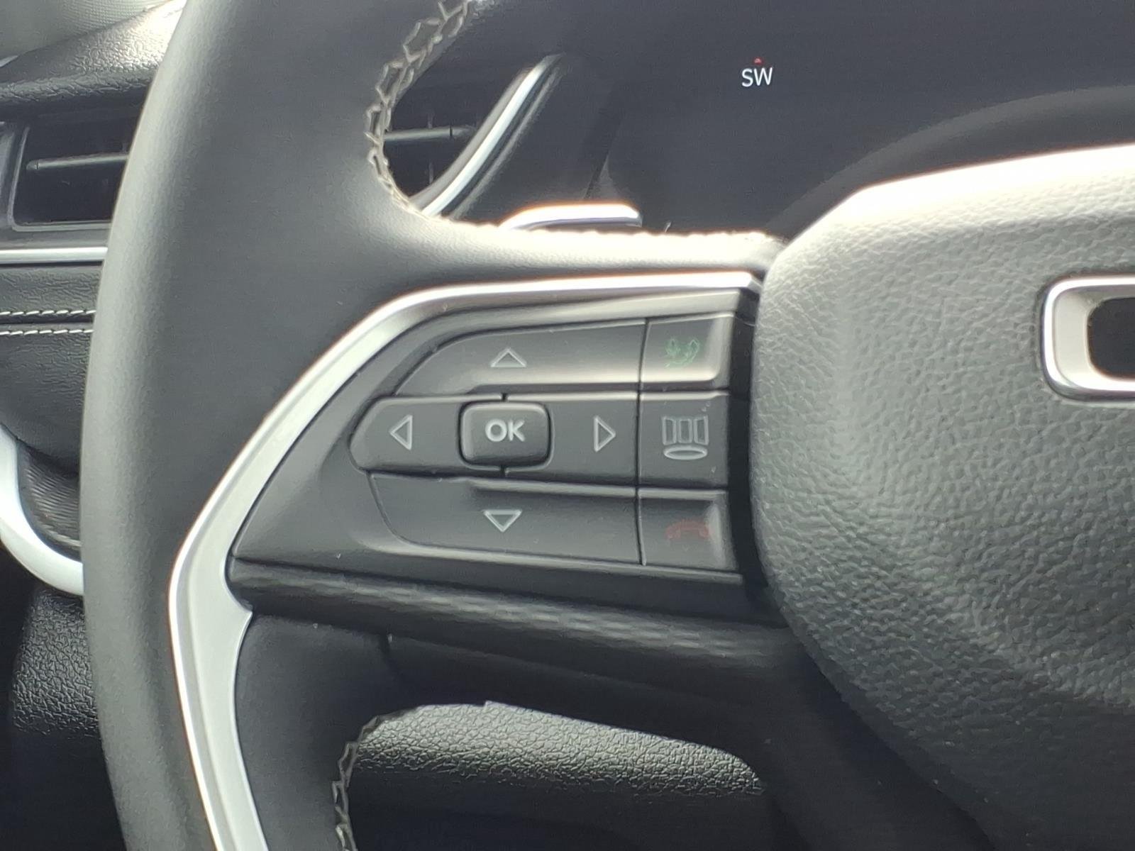 Used 2023 Velvet Red Pearlcoat Jeep Laredo image 26