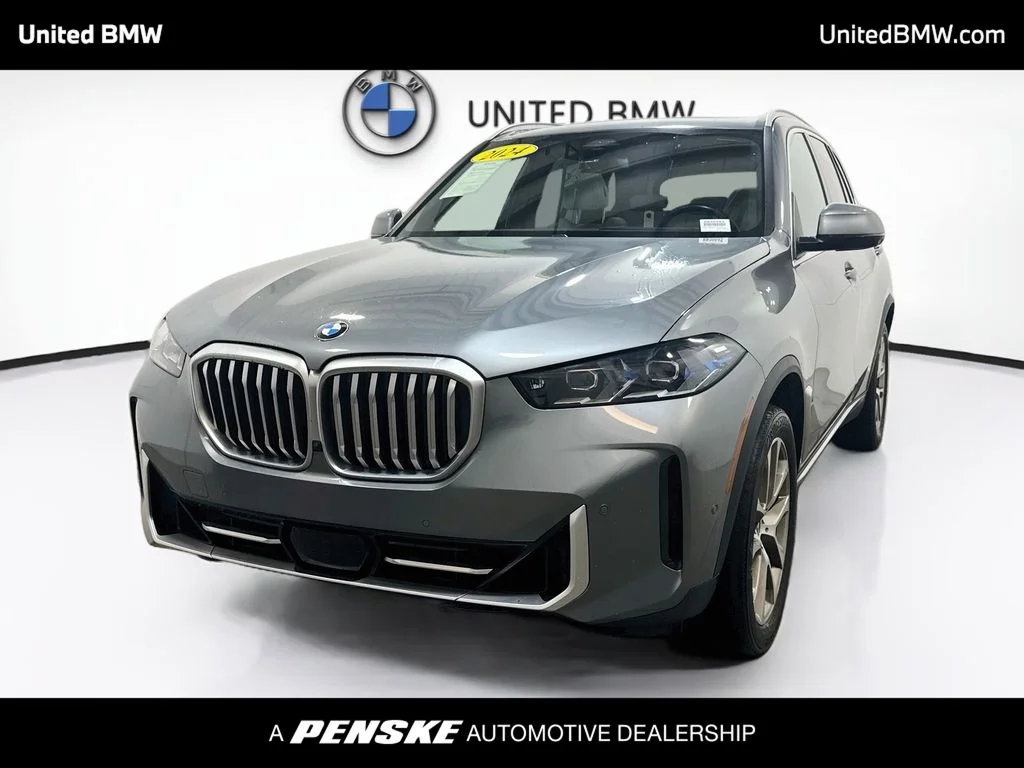 Certified Used 2024 Gray Metallic BMW sDrive40i image 1