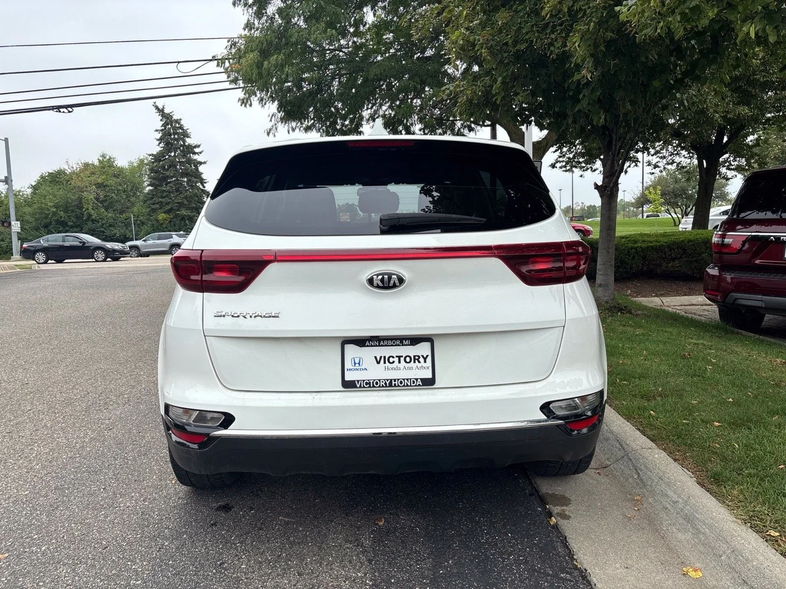 Used 2021 Clear White Kia LX image 6